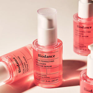 Flacons du sérum Biodance Pore Perfecting Collagen Peptide 30 ml, sérum coréen au collagène et peptides pour une peau plus ferme et lisse.